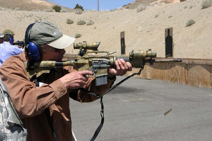 Robert Burke as guest of Washoe County Sheriffs Office, shooting a Colt M4 from SWAT team on April, 2008.